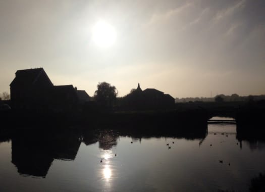 View from the bridge - Looking south from the bridge to the tide mill and drying kiln