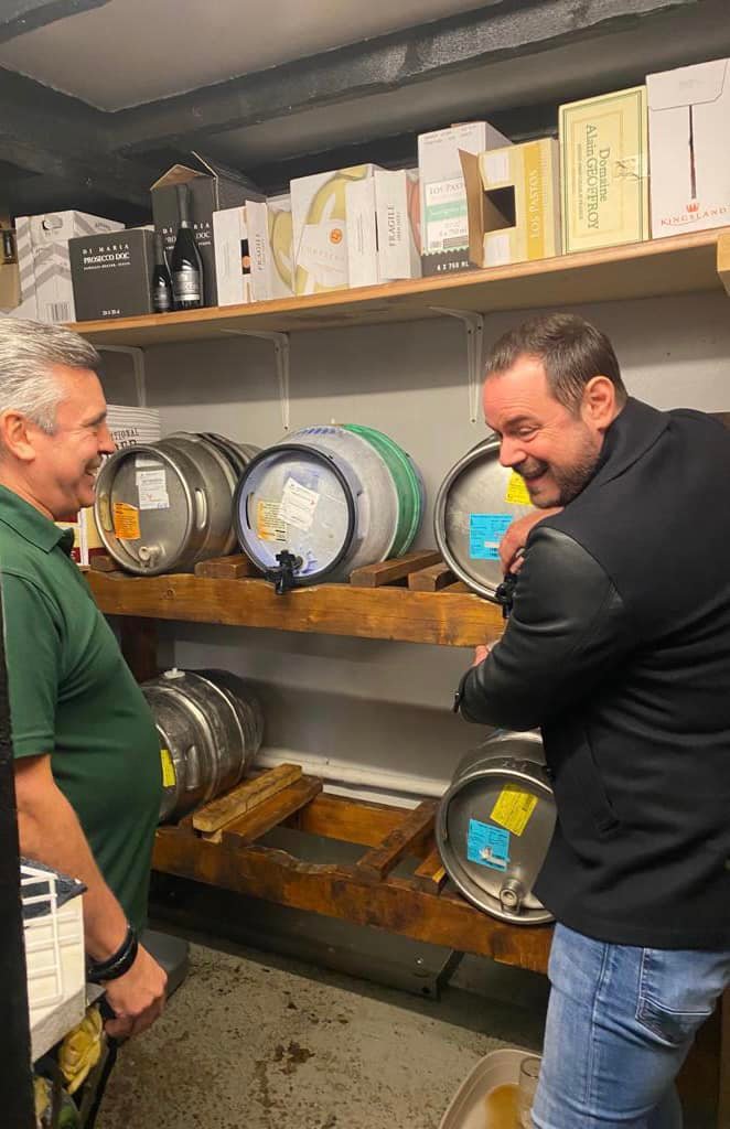 Steve of the One Green Bottle Micro Pub watching Danny pour a pint straight from the barrel Steve of the One Green Bottle Micro Pub watching Danny pour a pint straight from the barrel