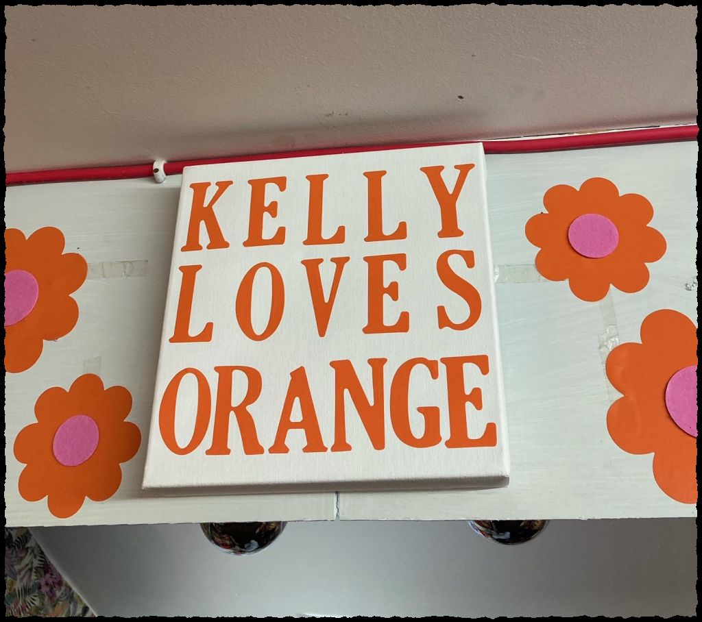 Kelly Loves Orange